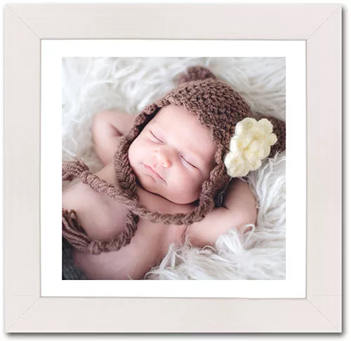 Babybild in Holzrahmen 1
